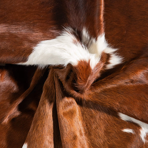 Brown and White Cowhide Rug Size 6'8" L x 5'1" W 9250