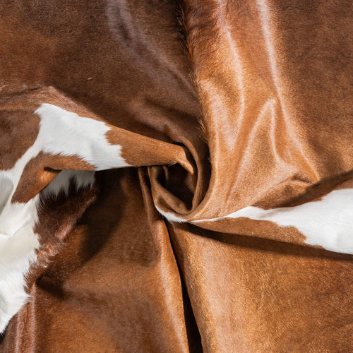 Brown and White Cowhide Rug Size 7'8" L x 6'9" W 9436