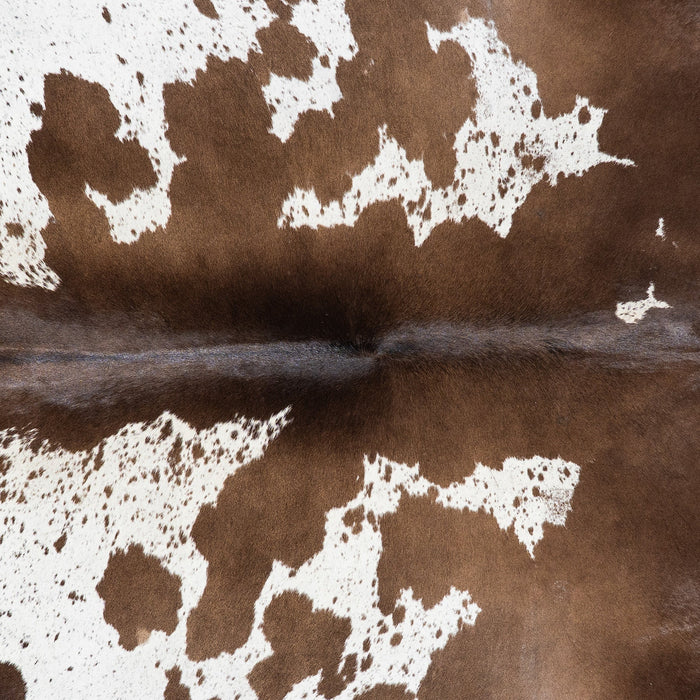 Brazilian Chocolate and White Cowhide Rug Size 7'6" L x 6'10" W 9928