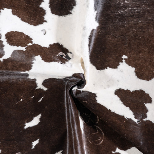 Vintage Chocolate and White Cowhide Rug Size 6'9" L x 5'8" W 5516