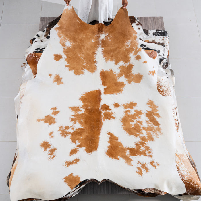 Brown and White Cowhide Rug Size 7'4" L x 6'7" W 5485
