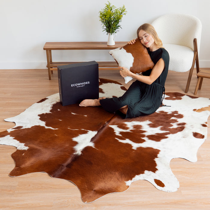 Brown and White Cowhide Rug