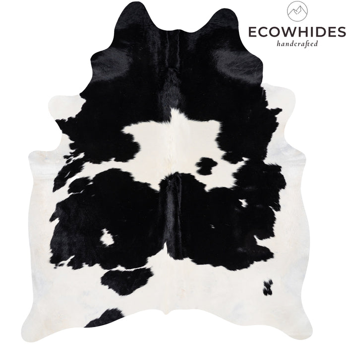 Black and white cowhide rug with 'Ecowhides' branding on a white background