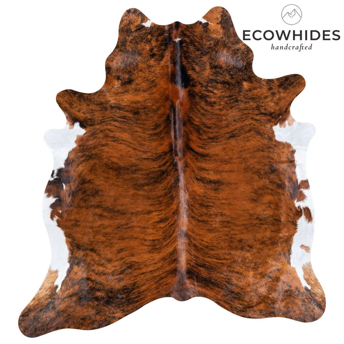Brindle White Belly Cowhide Rug with 'Ecowhides' branding on a white background
