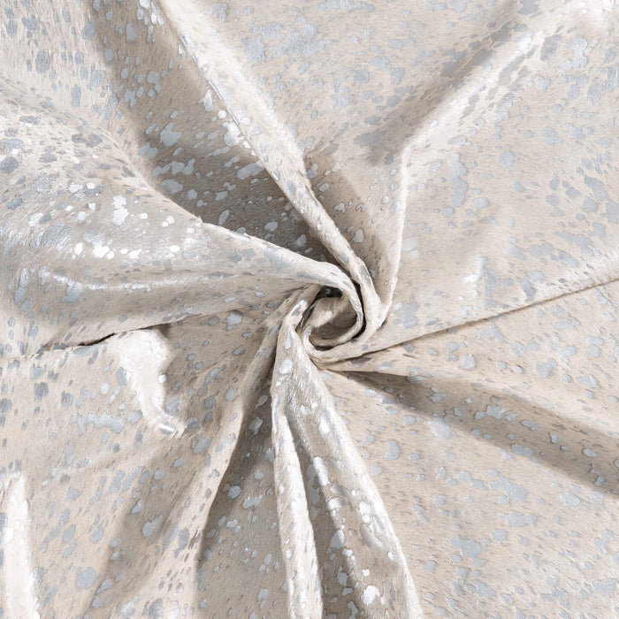Close-up of white leather with silver