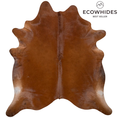 A solid brown cowhide rug with a natural pattern, displayed on a white background with the brand name 'ECOWHIDES' visible at the top.