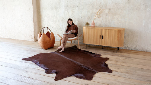 Cowhide rug in a reading nook