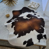 Close-up of mahogany and white calf hide natural texture