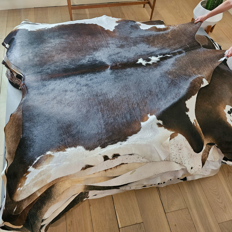 Brazilian Chocolate and White Cowhide Rug Size 5'10" L x 6'7" W 6558