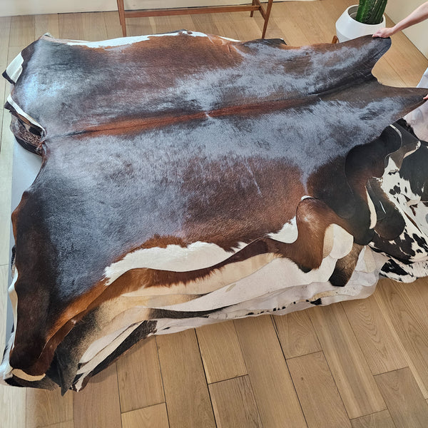 Brazilian Chocolate and White Cowhide Rug Size 7'3" L x 6'7" W 6560