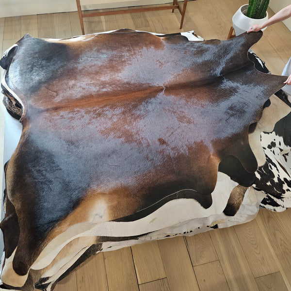 Brazilian Chocolate Cowhide Rug Size 7' L x 7'3" W 6567