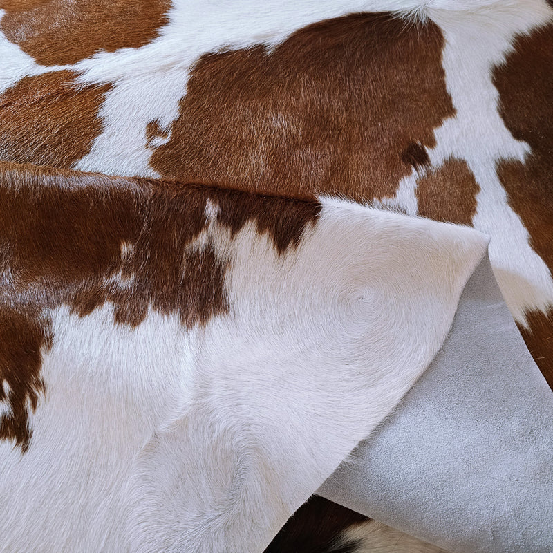 Brown and White Cowhide Rug Size 7'9" L x 6'10" W 6716