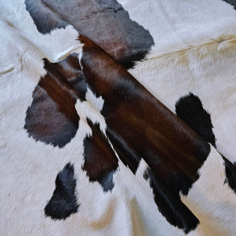 Brazilian Chocolate and White  Cowhide Rug Size 7'10" L x 6'7" W 7700