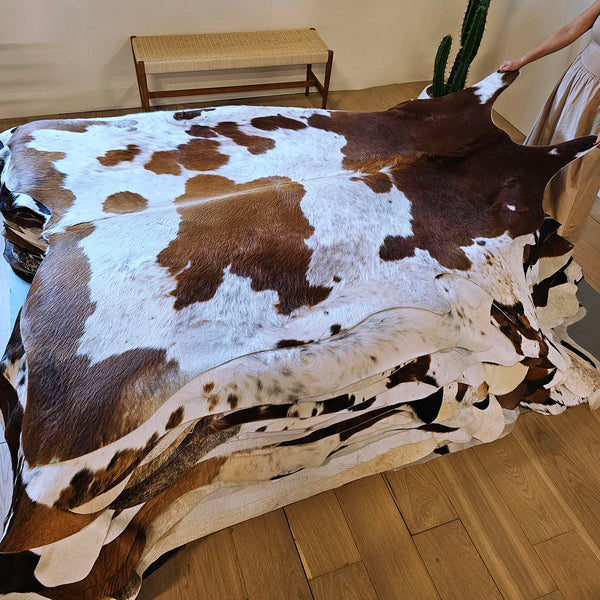 Brown and White Cowhide Rug Size 7'8" L x 5'9" W 7757