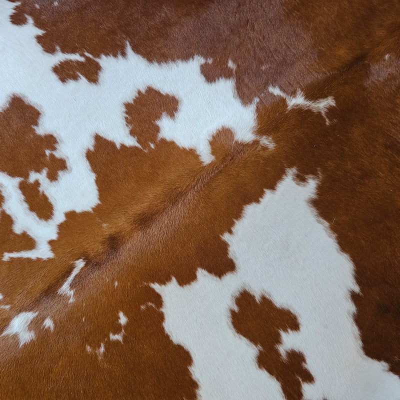 Brown and White Cowhide Rug Size 7'1" L x 6'9" W 7985