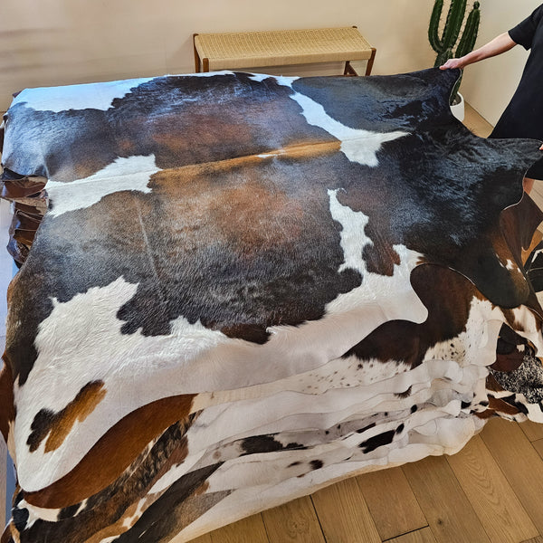 Chocolate and White Cowhide Rug Size 7'1" L x 6'7" W 8454