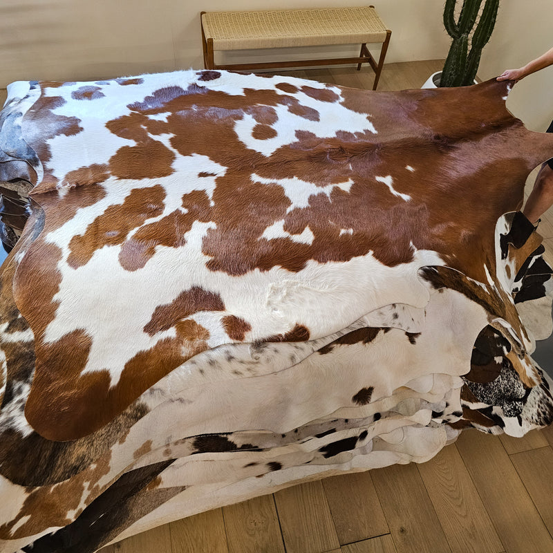 Brown and White Cowhide Rug Size 7'2" L x 6'5" W 8483