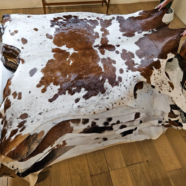 Brown and White Cowhide Rug Size 6'6" L x 6'4" W 8648