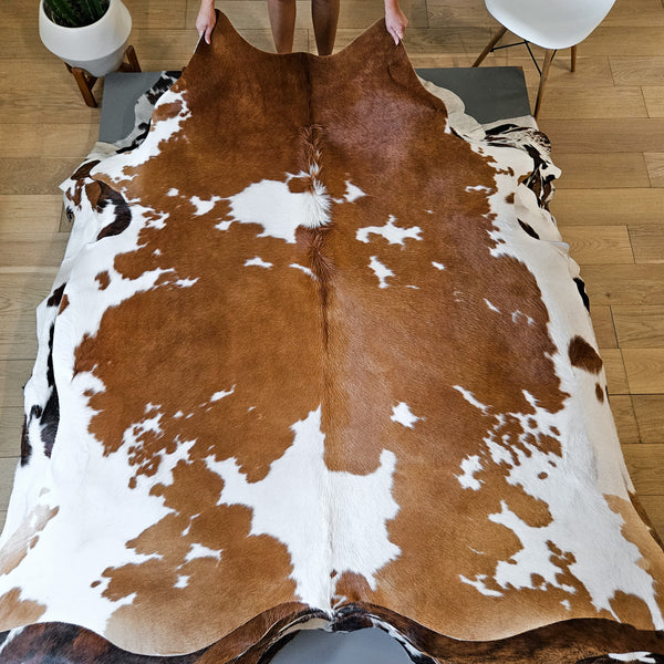 Brown and White Cowhide Rug Size 7'1" L x 6'8" W 8676