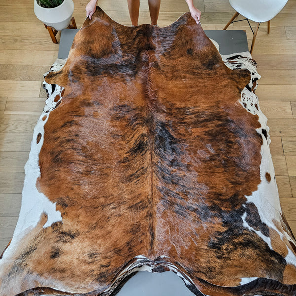 Brown and White Cowhide Rug Size 7'1" L x 6'8" W 8692