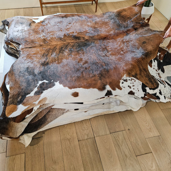 Brown and White Cowhide Rug Size 7'1" L x 6'8" W 8692