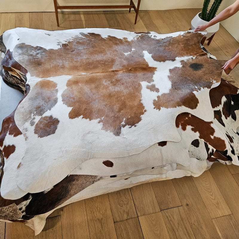 Brown and White Cowhide Rug Size 6'7" L x 6'6" W 8699