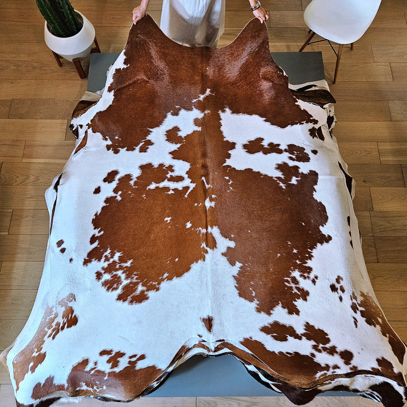 Brown and White Cowhide Rug Size 7'1" L x 6'9" W 7985