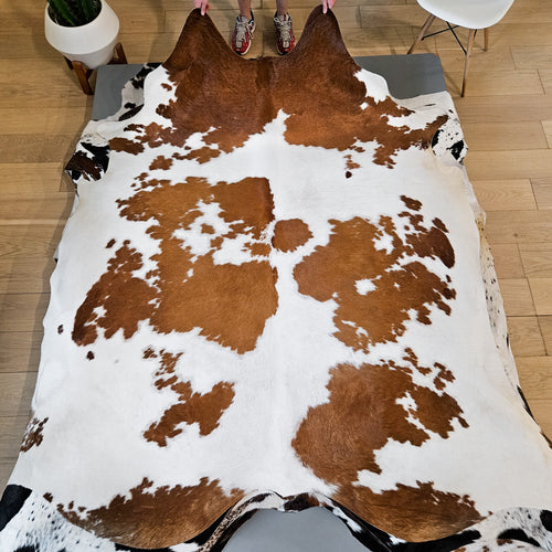 Brown and White Cowhide Rug Size 8'0" L x 7'4" W 9394