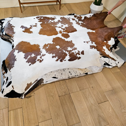 Brown and White Cowhide Rug Size 8'0" L x 7'4" W 9394