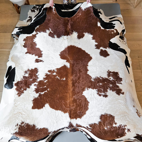 Brazilian Brown and White Cowhide Rug Size 6'9" L x 6'4" W 9348