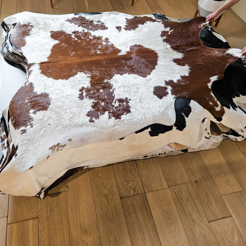 Brazilian Brown and White Cowhide Rug Size 6'9" L x 6'4" W 9348