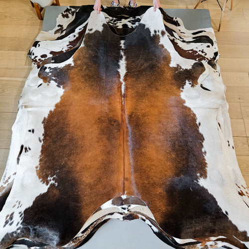 Brazilian Chocolate and White Cowhide Rug Size 6'8" L x 6'4" W 9371