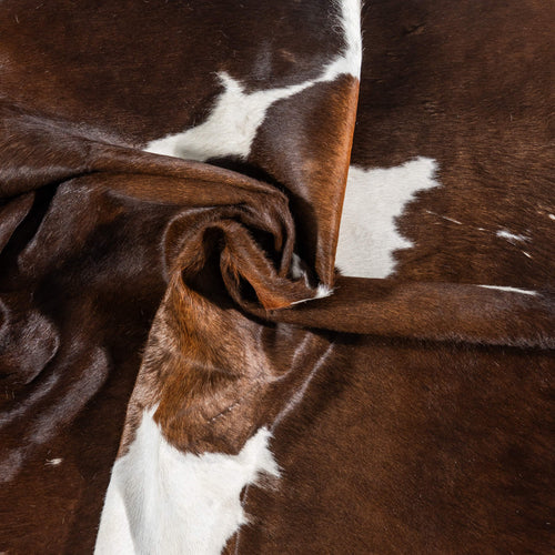 Vintage Chocolate and White Cowhide Rug Size 7'0" L x 6'9" W 2099