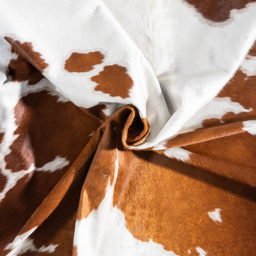 Brown and White Cowhide Rug Size 7'4" L x 5'10" W 9290