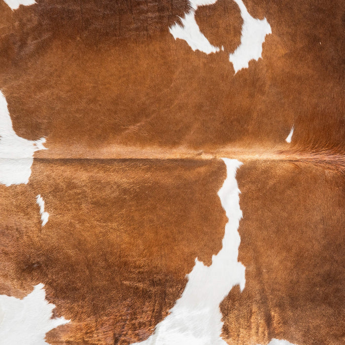 Brown and White Cowhide Rug Size 7'8" L x 6'9" W 9436