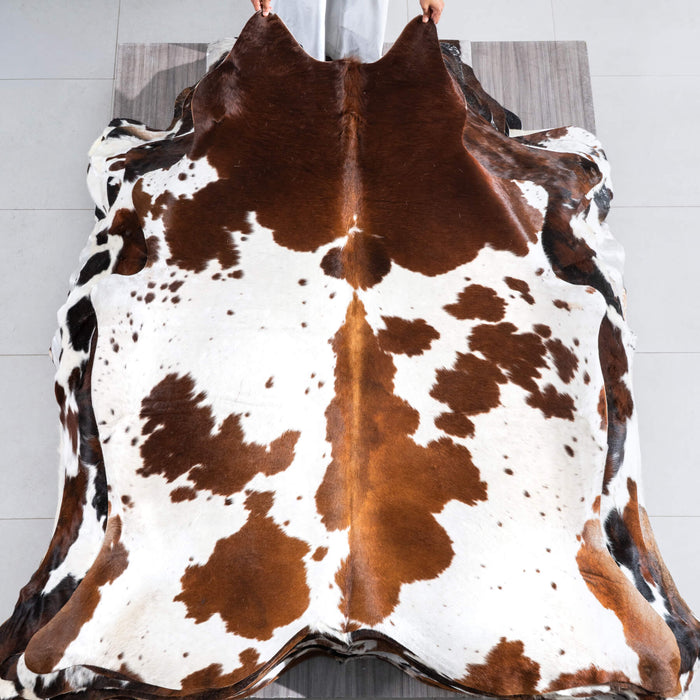 Brown and White Cowhide Rug Size 6'10" L x 6'1" W 9669