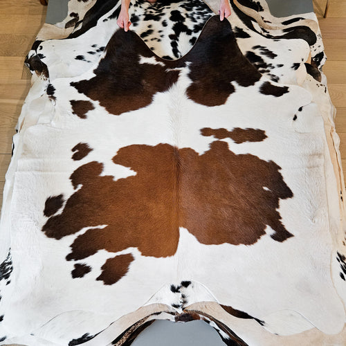 Brazilian Chocolate and White Cowhide Rug Size 5'6" L x 5'9" W 9376