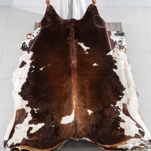 Chocolate and White Cowhide Rug Size 7'2" L x 6'5" W 5402