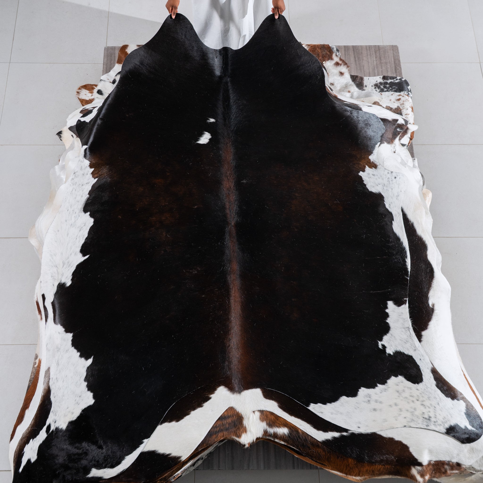 Chocolate and White Cowhide Rug Size 7'6