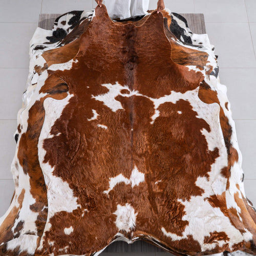 Brown and White Cowhide Rug Size 7'1" L x 5'2" W 6436