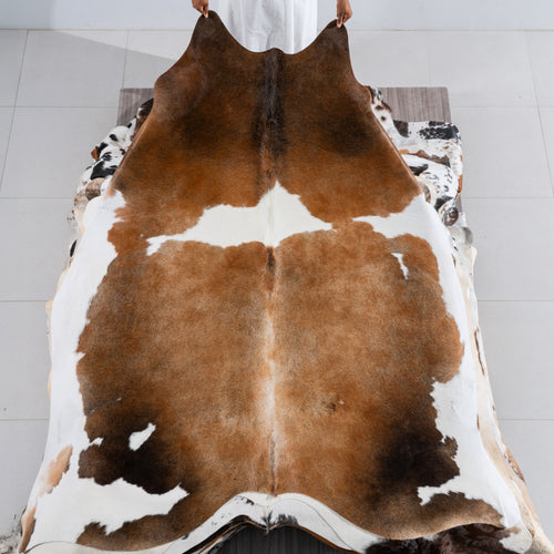 Chocolate and White Cowhide Rug Size 7'8" L x 6'11" W 5473