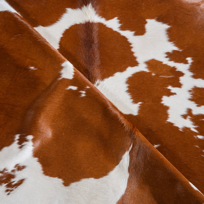 Brown and White Cowhide Rug Size 7'4" L x 6'10" W 4071