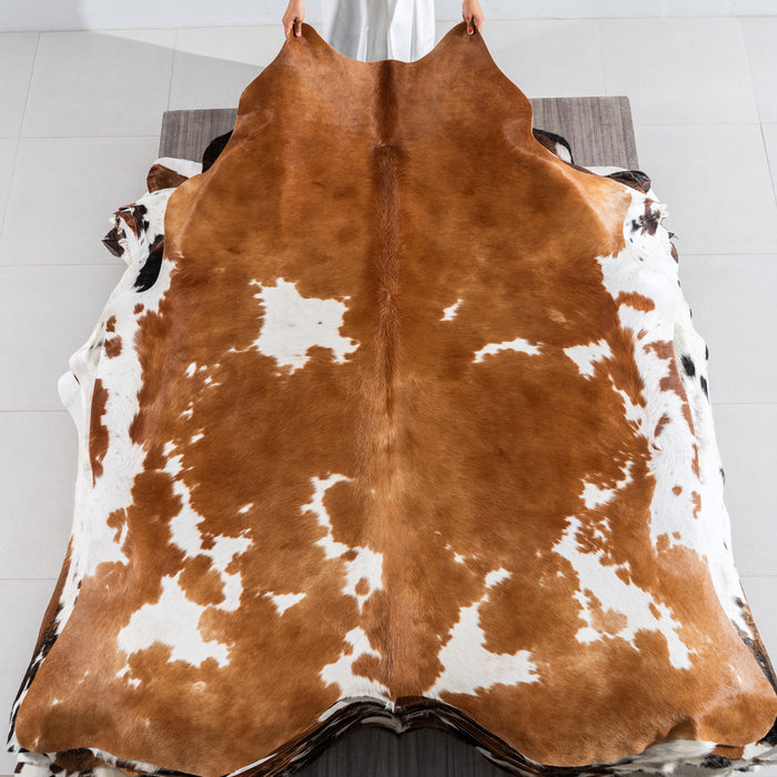Brown and White Cowhide Rug Size 7'5" L x 6'8" W 4137