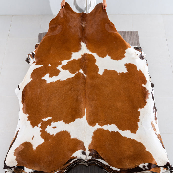 Brown and White Cowhide Rug Size 8'1" L x 6'9" W 4140