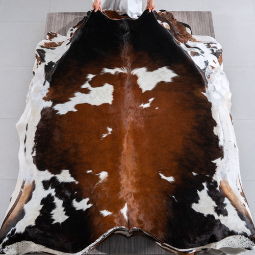 Chocolate and White Cowhide Rug Size 6'10" L x 6'9" W 4093