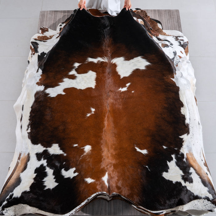 Chocolate and White Cowhide Rug Size 6'10" L x 6'9" W 4093