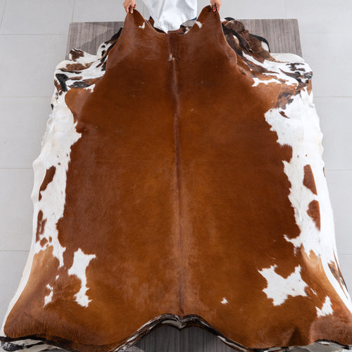 Brown and White Cowhide Rug Size 7'1" L x 6'9" W 4221