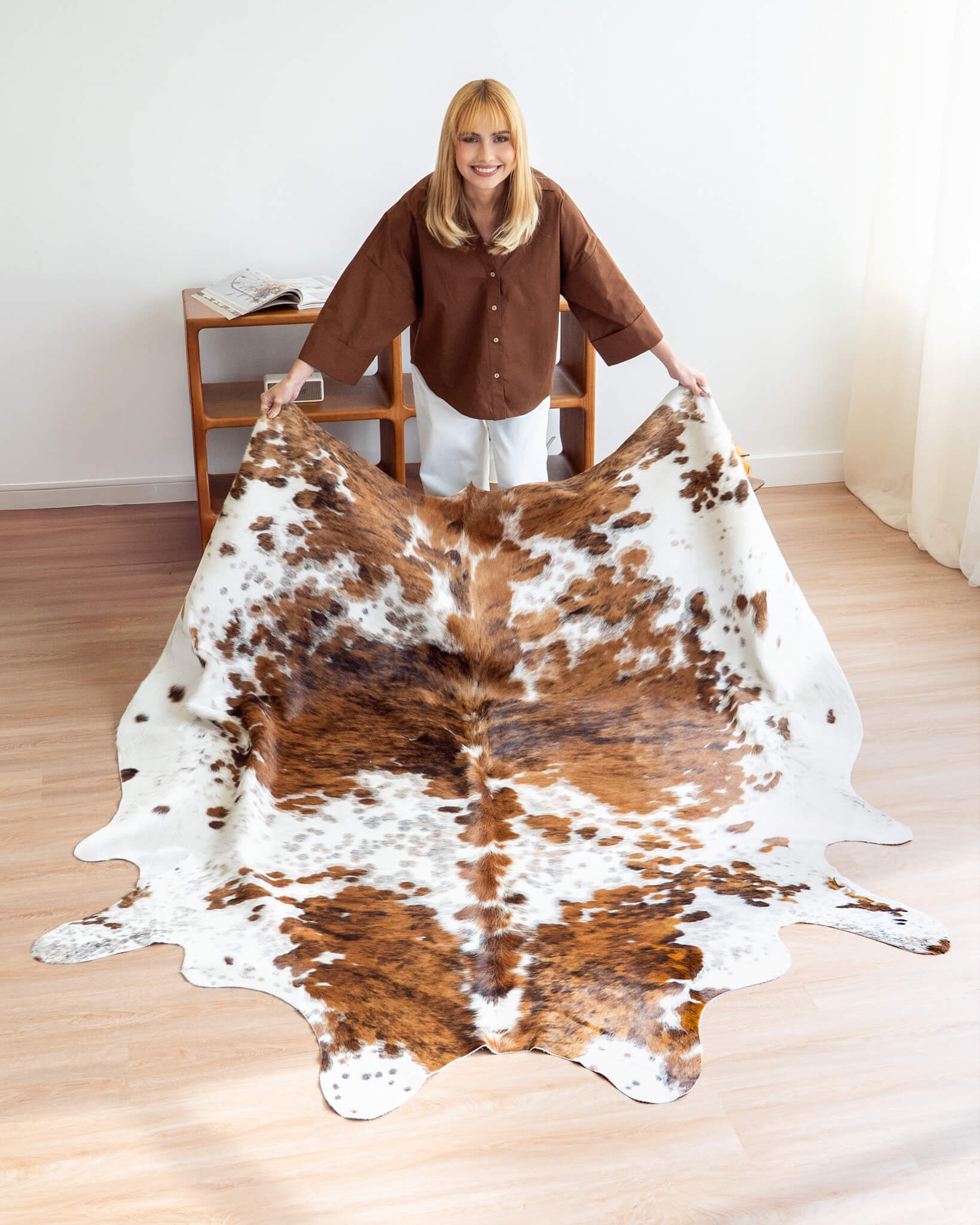 Cowhide Rug with model from Ecowhides
