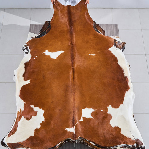 Brown and White Cowhide Rug Size 6'10" L x 6'2" W 2835