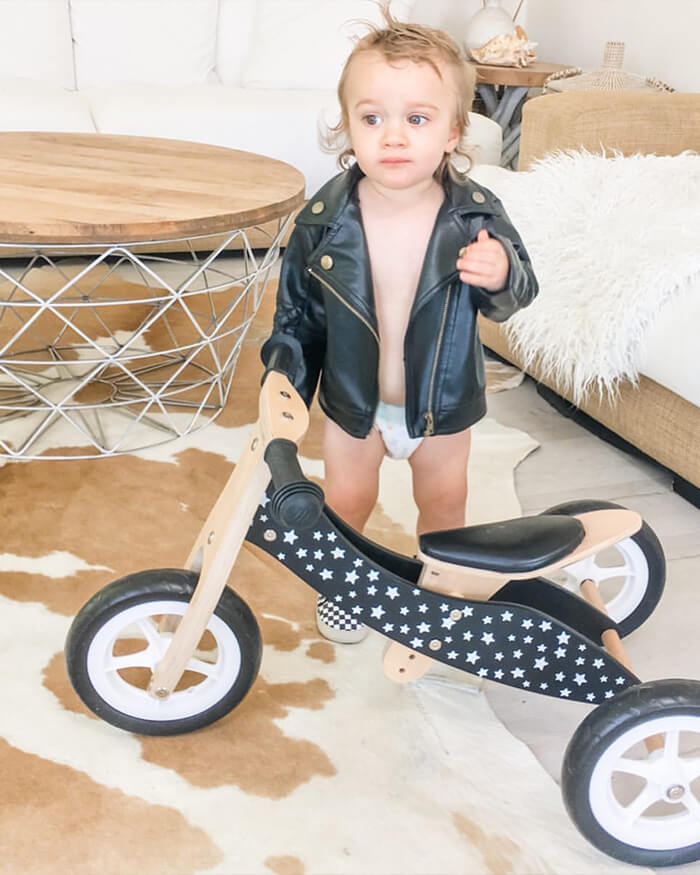 Baby on a Beige Cowhide Rug